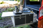 Preview: VanEssa Rear pull-out Riva kitchen block side view with side table