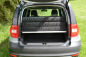 Preview: VanEssa sleeping system Skoda Yeti rear view packing state in the car