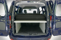 Preview: VanEssa sleeping system Dacia Dokker rear view packing state in the car