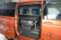 Preview: VanEssa Schlafsystem Surfer im VW T7 Multivan mit eingeklappten Einzelsitzen