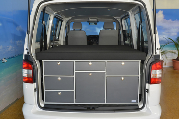 VanEssa sleeping system in addition to kitchen Transporter Caravelle with 3-seater bench - rear view