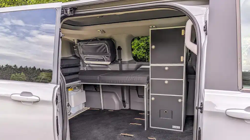 Transporter Caravelle installation camping modules Interior module storage module with top cabinet