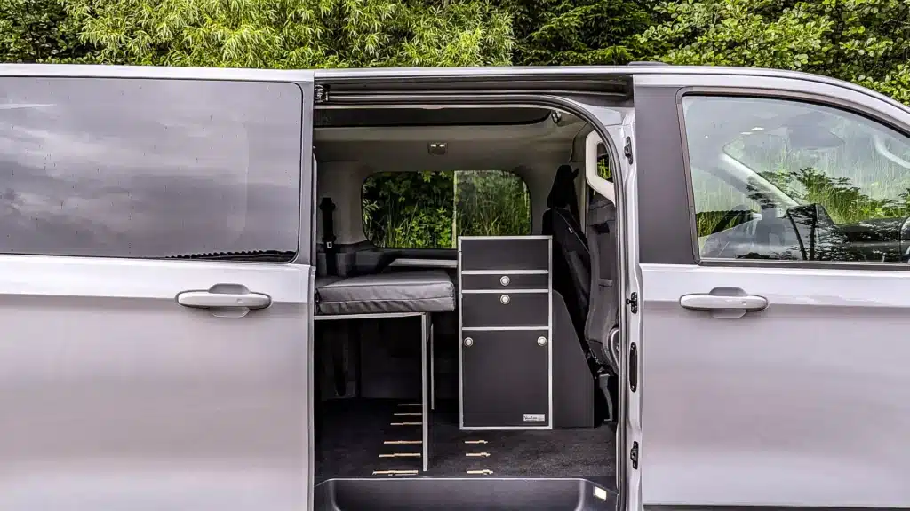 Transporter Caravelle camping modules Oslo indoor kitchen and Surfer sleeping system