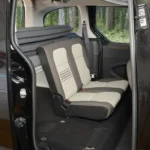 Berlingo II Partner Tepee sleeping system in forest sideways driving mode