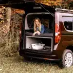 Doblo Combo sleeping system at the edge of the forest