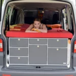 Sleeping system van to kitchen on vacation in Corsica with VanEssa rear kitchen