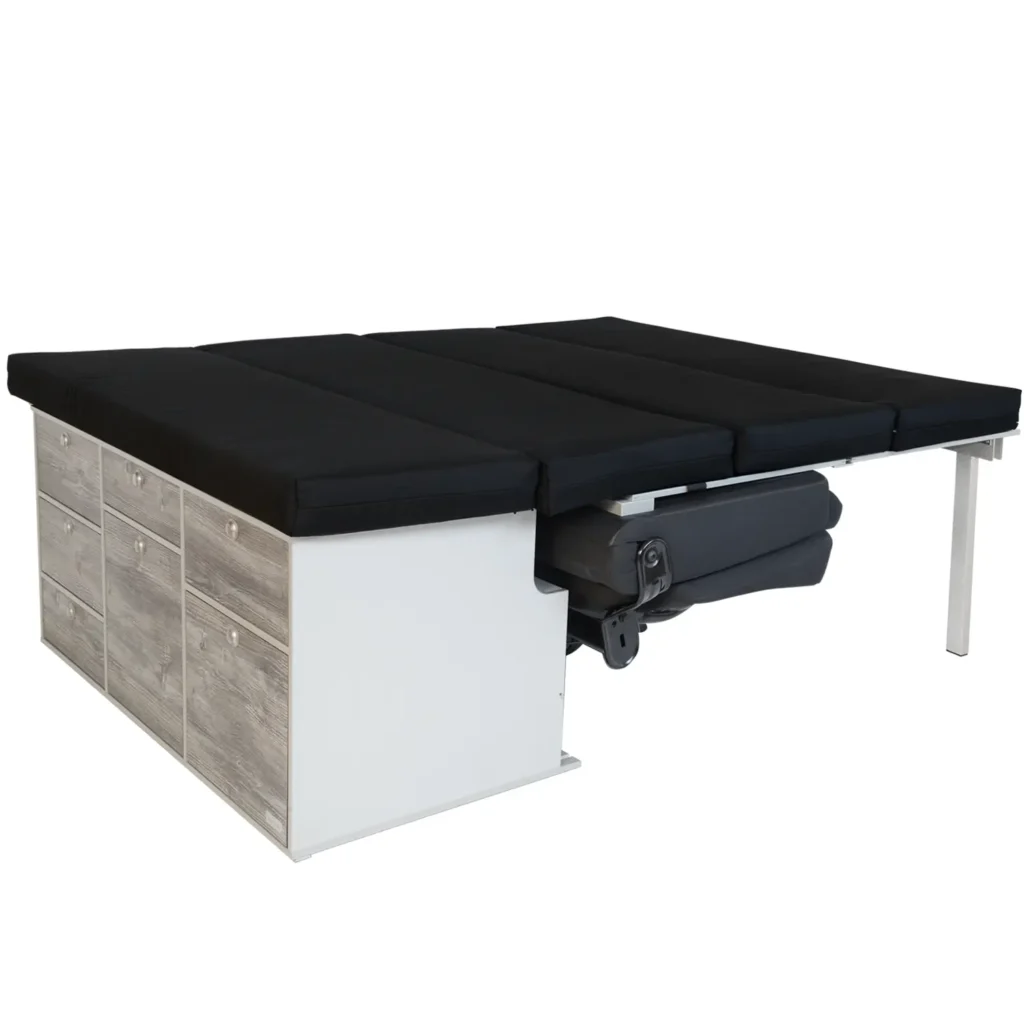 Van sleeping system built into the Vivaro kitchen with triple bench
