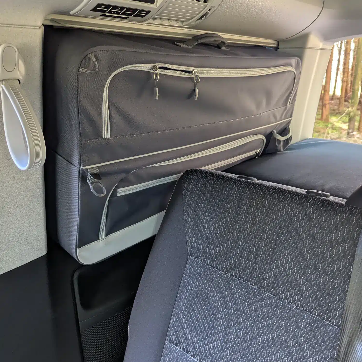 VanEssa pannier VW T5 T6 anthracite with VanEssa mattress and 3-seater bench from the inside