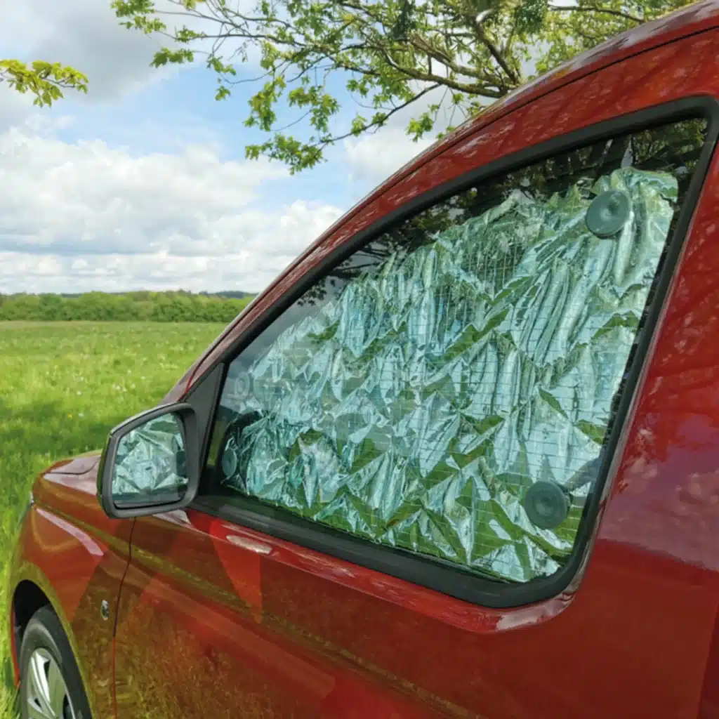 VanEssa thermal mats blackout VW Caddy Ford Tourneo Connect driver's side exterior